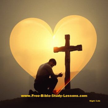 man kneeling at Cross with heart in background