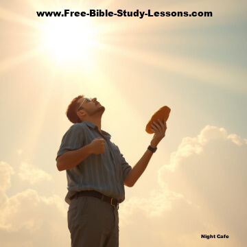 Man holding bread, looking to heaven