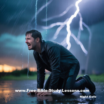 Man on knees in rain storm