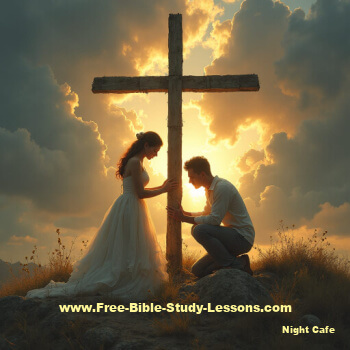 Couple kneeling at the cross