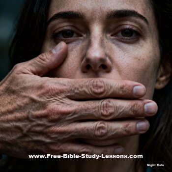 woman with man's hand over her mouth